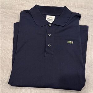 Perfect like- new condition. Navy Lacoste 100% cotton polo shirt.